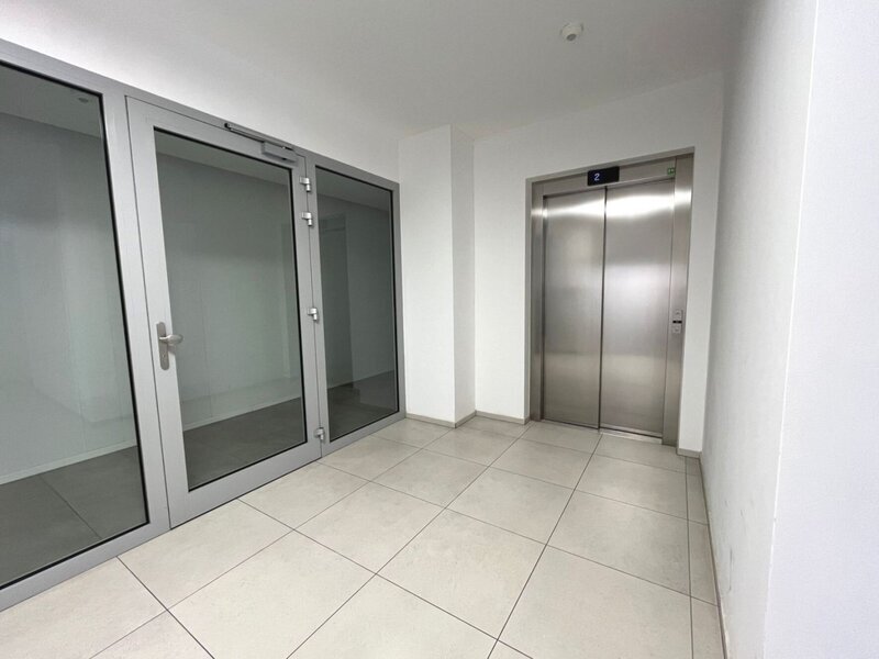 Prodej luxusního investičního bytu 1+kk v centru města Zlína s garážovým stáním